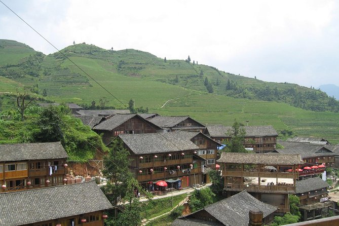 1-Day Longsheng Rice Terrace Tour from Guilin with Private Guide & Driver - Jin Zhu Zhuang Nationality Village: costumes, songs, and respectful photo rules
