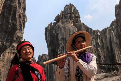 1 Day Stone Forest & Jiuxiang Cave Tour - Jiuxiang Scenic Region: Boat Through the Caves, Cable Car for the Views