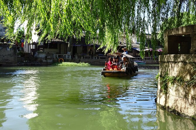 3-Day Private Shanghai and Ancient Water Town Tour - Airport meeting and the Shanghai Tower reset button