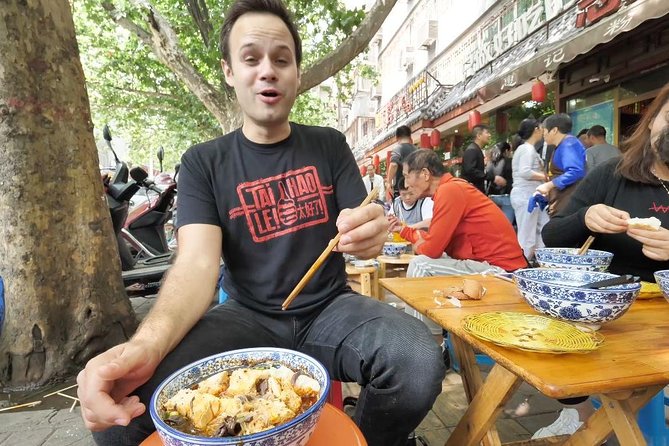3-Hour Private Night Tour: Beijing Foodie Experience - Zhangzizhong Street snacks: tanjianbing and the sweet-savory roller coaster