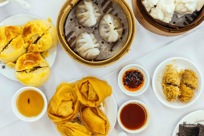A Taste of Hong Kong: Private Tour With Locals - Flower Market Road: a historic bazaar start