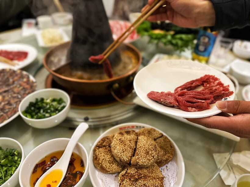 Beijing Hutong Food Crawl Delights: Peking duck, Hotpot&More - Mongolian Hot Pot in a Charcoal Copper Pot