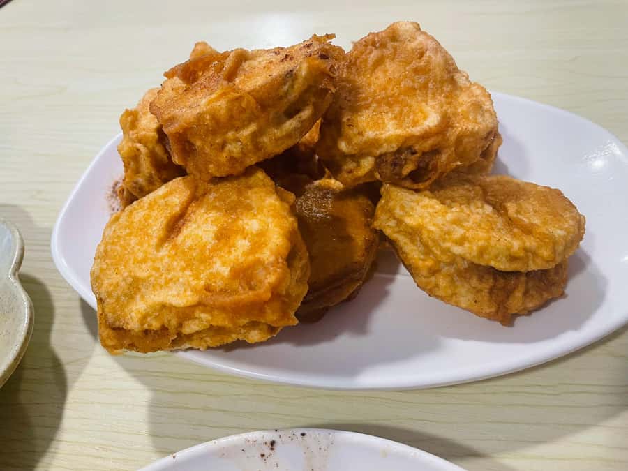 Bite and Stroll: Brunch Tour in Old Town Beijing! - Stop 1 and the first bite on Xisi North Street