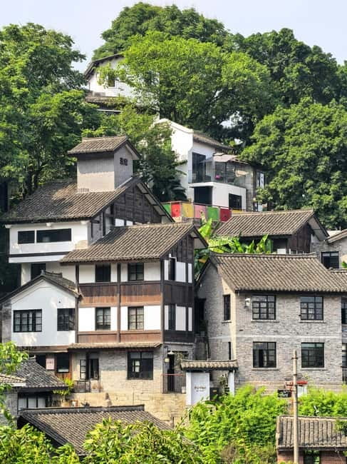 Chongqing: Trendy Spots, Cableway & Ferry Private Tour - Changjiahui Danzishi Laojie St: vertical streets and cliffside life