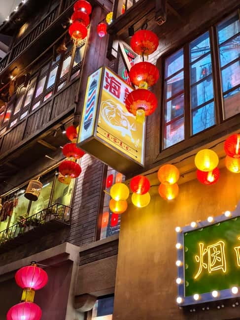 Chongqing: Trendy Spots, Cableway & Ferry Private Tour - Daijia Lane and Kuixinglou: tight spaces, big city angles