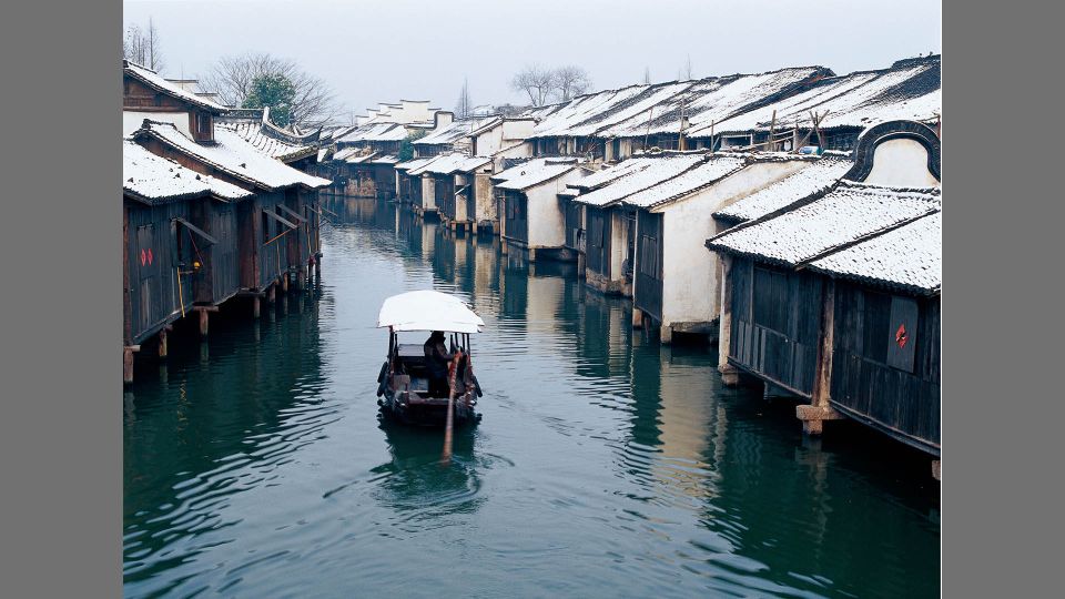 Delve into Wuzhen Water Town: Private Tour from Shanghai - From Shanghai hotel to Wuzhen, with real door-to-door comfort