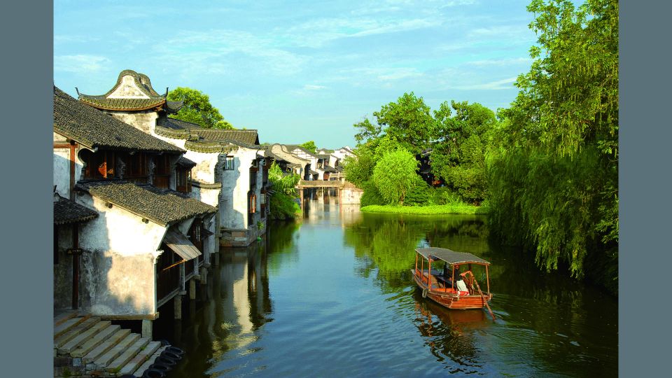Delve into Wuzhen Water Town: Private Tour from Shanghai - Sunset walking: golden light on bridges and lanes