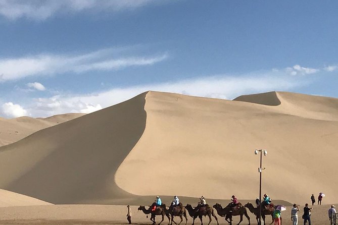 Dunhuang Private Day Tour Mogao Grottoes, Singing Dunes and Crescent Moon Spring - A One-Day Taste of Dunhuang: Mogao Caves, Singing Dunes, Crescent Moon Spring
