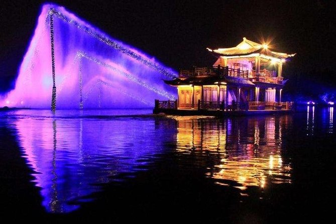 Enduring Memories of Hangzhou West Lake Show VIP Ticket with Private Transfer - VIP seats and open-air comfort: how to handle cool evenings and light rain