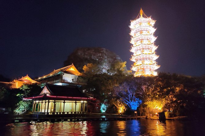 Guilin Four lakes night cruise with the English speaking driver from Guilin hotel - Onboard Entertainment: Music, Lanterns, and the Stuff You Came For