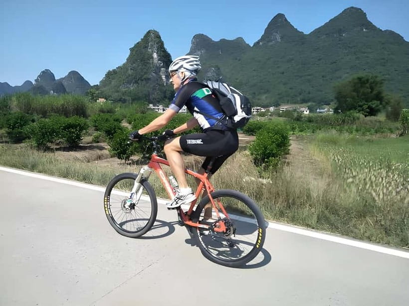 Guilin: Li River Cruise, Yangshuo Biking & Flexible Pricing - Yangshuo Biking: Yulong River Views, Water Buffalo Trails, and Karst Close-Ups