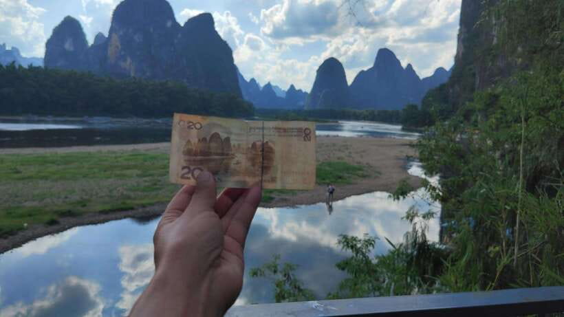 Guilin: Private Mountains and Rivers Day Tour - Yulong River bamboo boat: the calm part of the day