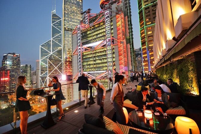 Hong Kong Guided Dinner + Laser Show Lounge Entry (2023) | 200+ booked - Wan Chai in the description, Kowloon in the walk: where this tour actually goes