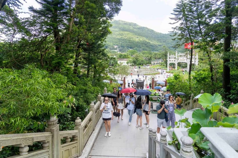 Hong Kong: Lantau Big Buddha Tour with Cable Car - Tai O Fishing Village: stilt houses, history you can see, and a boat option