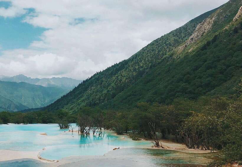 Huanglong Scenic Area: Explore Stunning Five-Colored Ponds - Practical Timing for Busy Days: cable car up, walk down