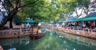 Immerse in Suzhou & Tongli: Private Day Trip - The canal boat ride and lunch setup (and what if weather changes)