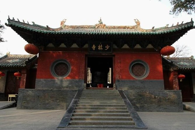 Luoyang Private Day tour to Longmen Grottoes and Shaolin temple - Longmen Grottoes: Where the Stone Tells a Story