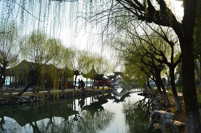 Mini Group: One-Day Zhouzhuang and Jinxi Water Town Tour - Zhouzhuang Water Town: Bridges, Black Tiles, White Wells, and Courtyard Stops