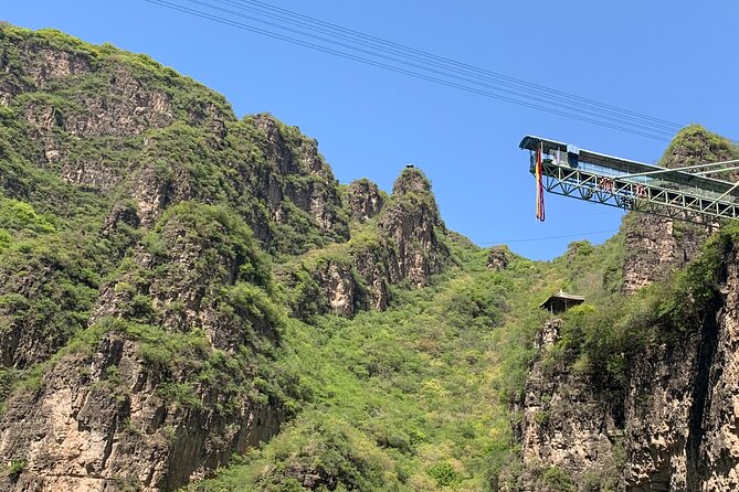Private Day Tour to Longqing Gorge and Dingling at the Ming Tombs with Lunch and Boat Ride - Longqing Gorge: escalator views, then a boat ride on aquamarine water