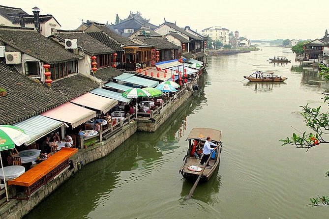 Private Day Tour: Zhujiajiao Water Town with Shanghai Local Shopping Outing - South Bund Fabric and goods market: silk, cashmere, and more