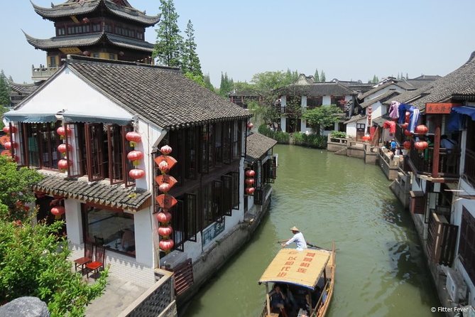 Private Full Day Tour: Zhujiajiao Ancient Water Town with Best of Shanghai - Zhujiajiao Ancient Water Town: bridges, old streets, and calm river time