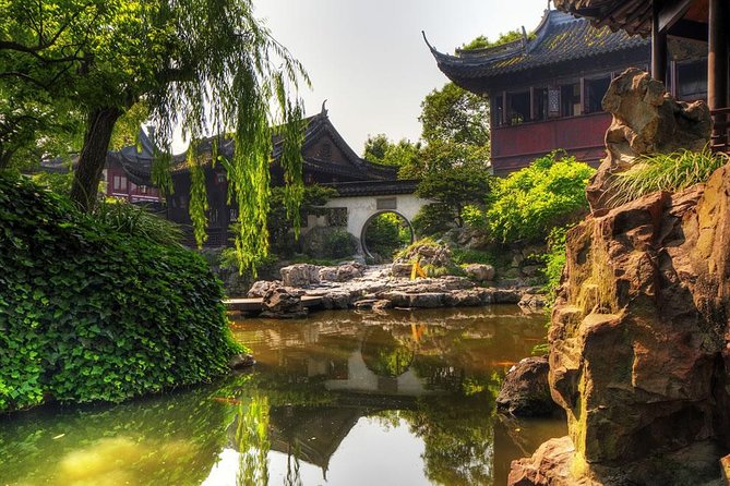 Private Full Day Tour: Zhujiajiao Ancient Water Town with Best of Shanghai - The Bund: Huangpu River views and the architecture mix
