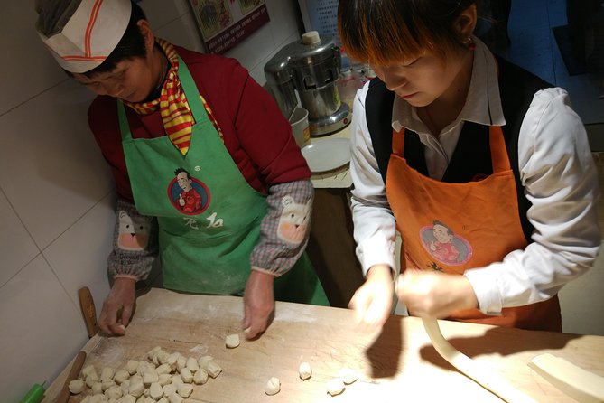 Private Hutong Culture Tour with Dumpling Cooking Class plus Cricket Fighting Game - Guide experience: when names and attention matter
