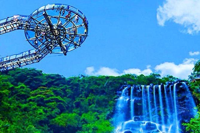 Private Tour to Gulong Canyon with Glass Bridge and Water Falls from Guangzhou - The UFO-shaped circular glass platform and the waterfall angle