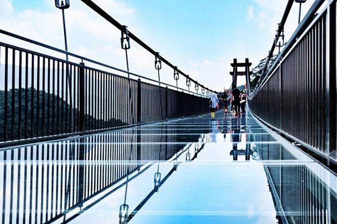 Private Tour to Gulong Canyon with Glass Bridge and Water Falls from Guangzhou - Entering Gulong Gorge: waterfalls, fresh air, and real walking