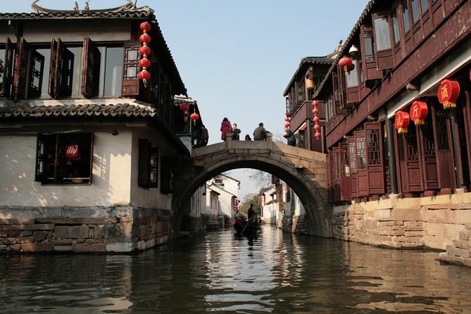 Private Tour: Zhujiajiao Water Town from Shanghai - Fangsheng Bridge: the fish-release stop you’ll remember