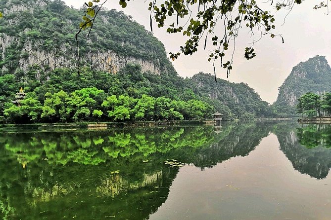 Seven Star Crags Karst Cave Mirror Lake Bird Islands Private Tour - Food on the day: sticky rice with pork and salted egg yolk