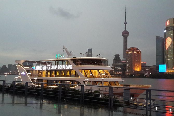 Shanghai Afternoon Sightseeing Tour including Huangpu River Cruise & OTV Tower - Nanjing Road time: a pedestrian shopping street for photos and snacks