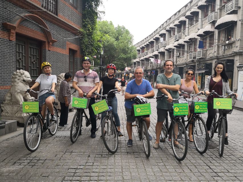 Shanghai: Full Day Classic Bike Tour With an Authentic Lunch - Japanese Concession Starts, an Ancient Park, and Nongtang Shikumen Lanes