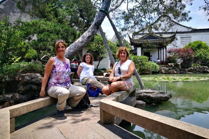 Shanghai: Top 5 Highlights All Inclusive Private Day Tour - Jade Buddha Temple: two jade statues and a very specific story