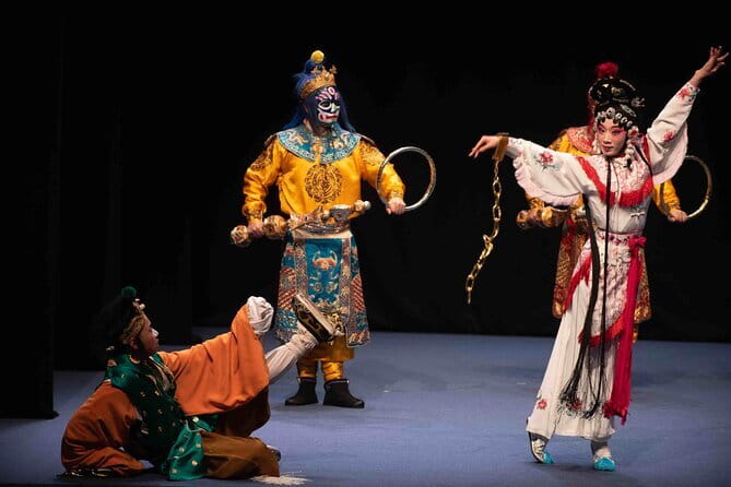 Sichuan Opera with face-changing at Sichuan opera theater - The show’s style: music, dance, acrobatics, and skits (not just singing)