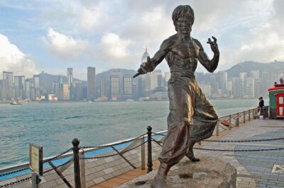 The Legendary Bruce Lee Experience Tour - Tsim Sha Tsui: start point, city energy, and the Bruce Lee Statue stop