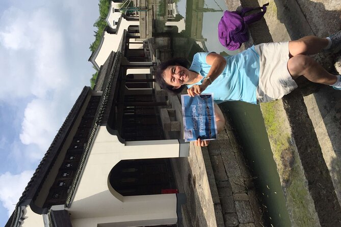 Wuzhen Water Town Delight Tour With Riverside Lunch Experience - Guides you’ll remember: May and Iris as examples of the experience