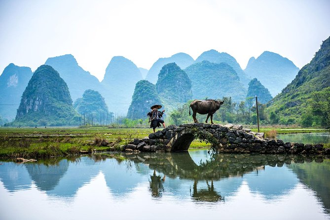 Xingping Xianggong Hill and Yangshuo Countryside Classic Day Tour - Late morning into lunch: Xingping and a local river crossing