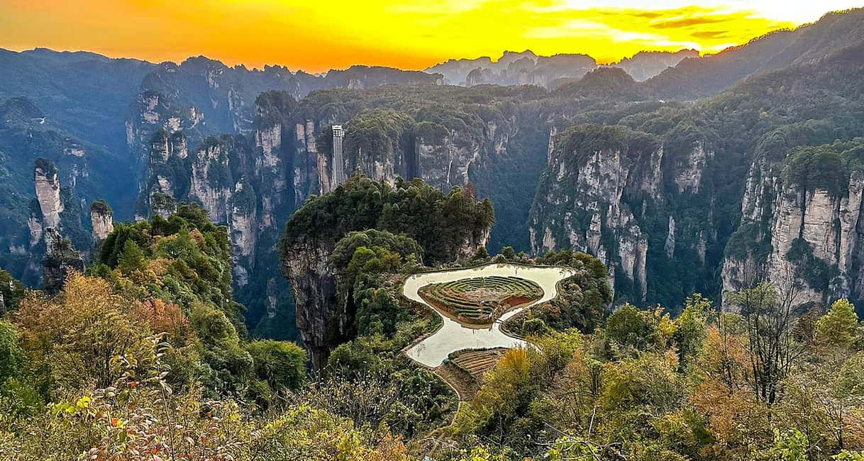 Zhangjiajie: Mini Group Day Tour with Bailong Elevator - Getting around inside the park: eco-buses, walking, and cable car timing