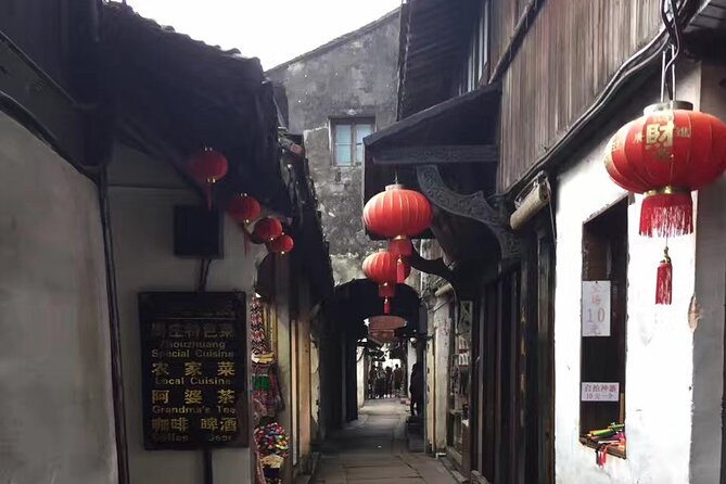 Zhouzhuang Water Village Tour from Shanghai - Zhouzhuang at a glance: 5 hours, old canals, and two big house visits