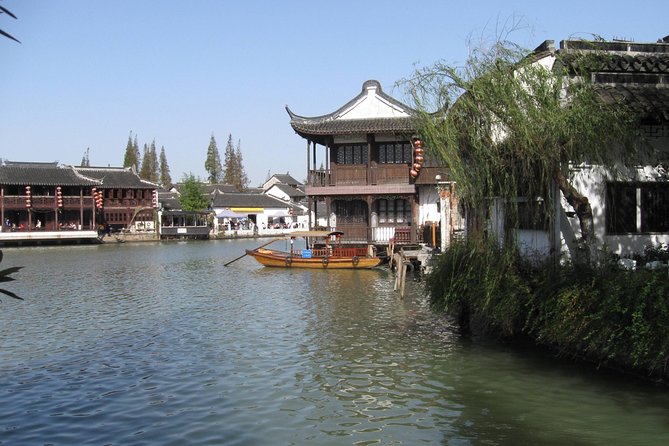Zhujiajiao Water Village & Seven Treasure Town Day Tour from Shanghai - Zhujiajiao Ancient Town: five-arch bridge, temples, and a slower river rhythm